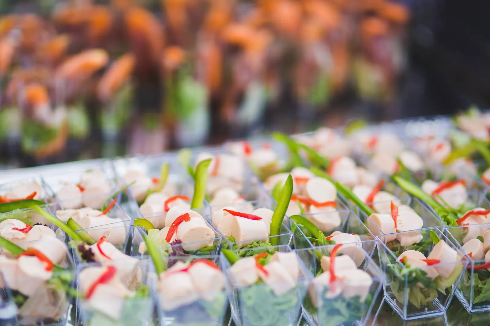 Canapés in glasses laid out for guests
