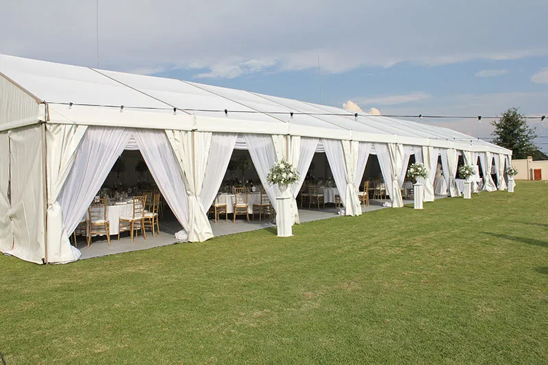 A long frame tent with every bay open